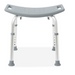 The Medline Bariatric Shower Chair without Back comes in gray and features an adjustable-height seat, non-slip rubber feet, a curved design, and built-in handles for added stability.