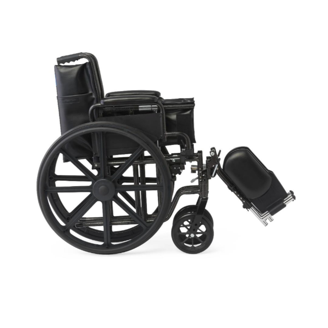 The Medline Guardian K1 Wheelchair with vinyl upholstery, shown in side view on a white background, features large rear wheels and an elevated leg rest—ideal for everyday use.