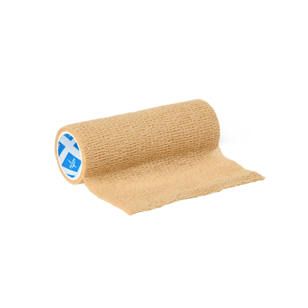 A Medline Non-Sterile Tam Self-Adherent Wrap Short Roll in beige is partially unrolled on a white background, revealing a blue and white label inside the roll.