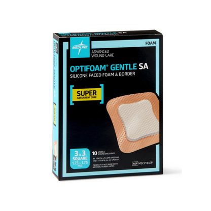 A box of Medline Optifoam Gentle SA Silicone-Faced Foam Wound Dressings contains 10 sterile 3"x3" dressings, each with a superabsorbent core. The black and blue box highlights the gentle silicone adhesive and foam border design.