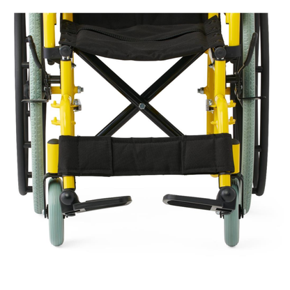 Front view of the Medline Pediatric Kidz Guardian Wheelchair in yellow with light green wheels, black seat fabric, and footrests on a white background, highlighting its adjustable comfort and safety features.