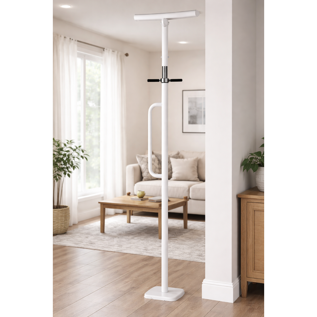 The Medline Security Pole with Handle - Fall Prevention Standing Aid stands in a bright living room with wood floors, beige sofa, coffee table, indoor plant, and large window with sheer curtains.