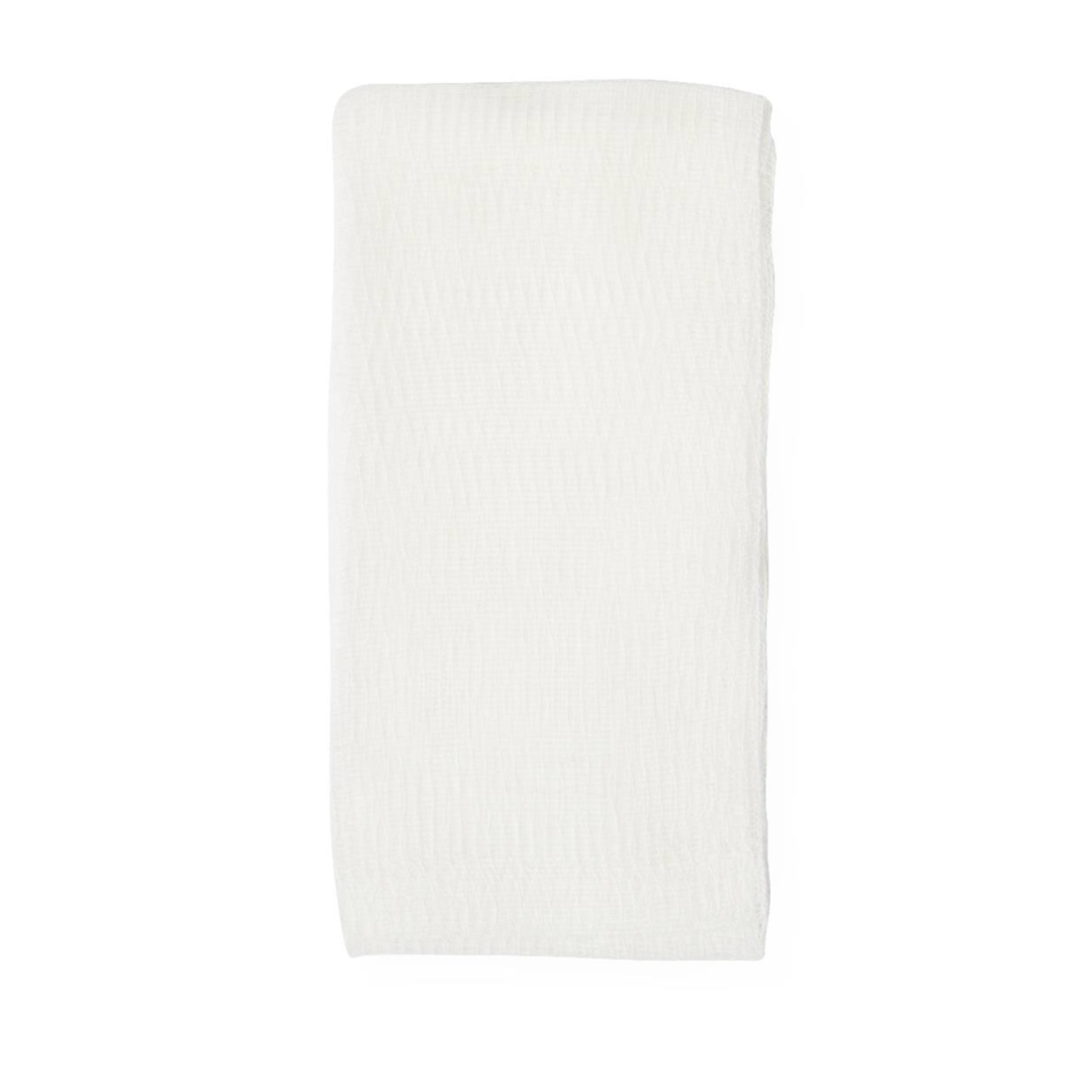 A Medline Sterile 100% Cotton Woven Gauze Sponge, neatly folded and textured, is shown on a white background.