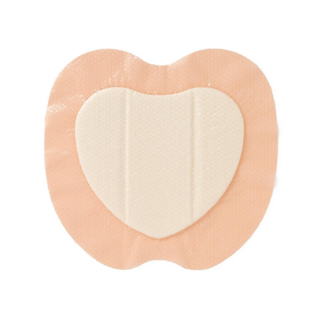 The Medline Optifoam Gentle EX Silicone-Faced Foam Wound Dressing is heart-shaped with a beige border, white padded center, advanced wound care features, and a superabsorbent core, shown against a white background.