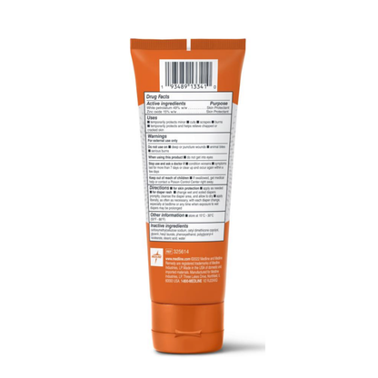 The Medline Remedy Specialized Extra Thick Zinc Oxide Paste comes in an orange tube with a white cap and barcode, featuring a drug facts label on the back listing active ingredients, uses, directions, and warnings. Ideal for sensitive skin and stands upright.