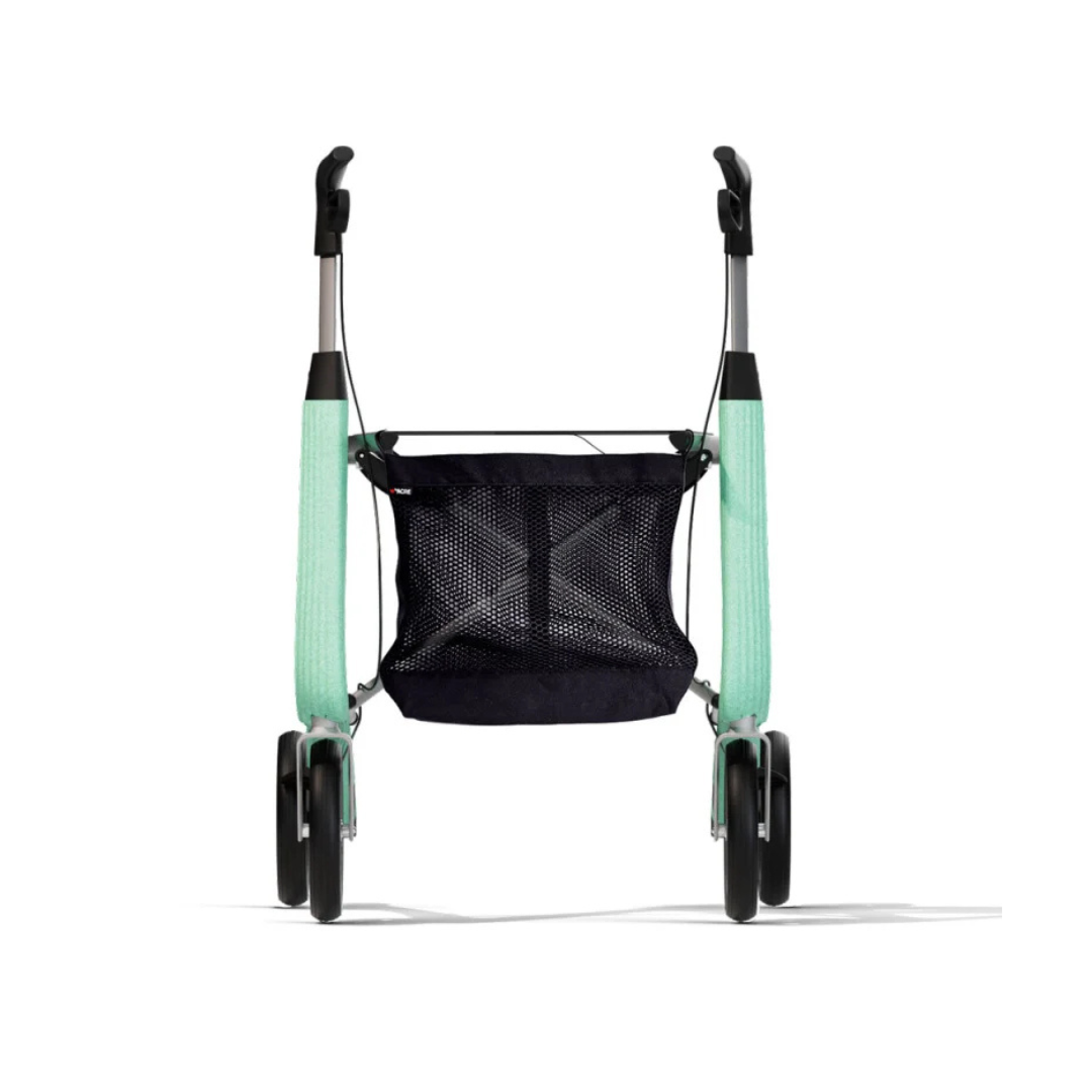A rear view of the Mesh Bag For ByAcre Rollators—a black mesh storage basket designed to double as an outdoor rollator mesh bag—shown attached to a lightweight stroller with mint green handles and four black wheels, set against a white background.