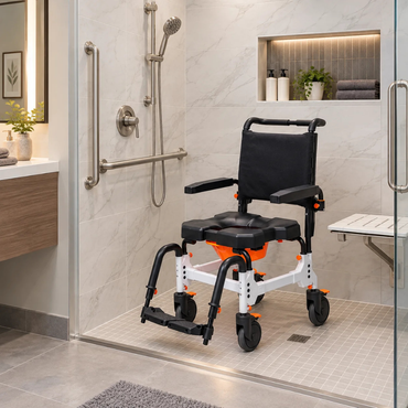 A MetaPal® M1-AP Attendant-Propelled Shower Commode Chair with a black seat and backrest positioned in a walk-in shower.