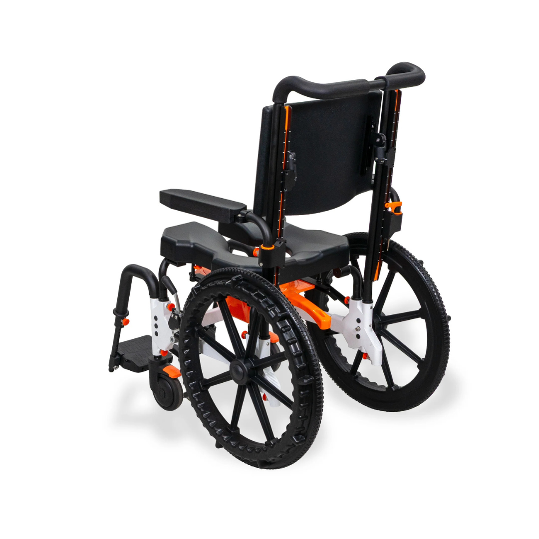 A bright orange MetaPal® M1-SP Self-Propelled Shower Commode Chair featuring a black seat, backrest, and large wheels.