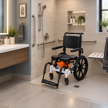A MetaPal® M1-SP Self-Propelled Shower Commode Chair with large black wheels and a black seat placed in a walk-in shower.