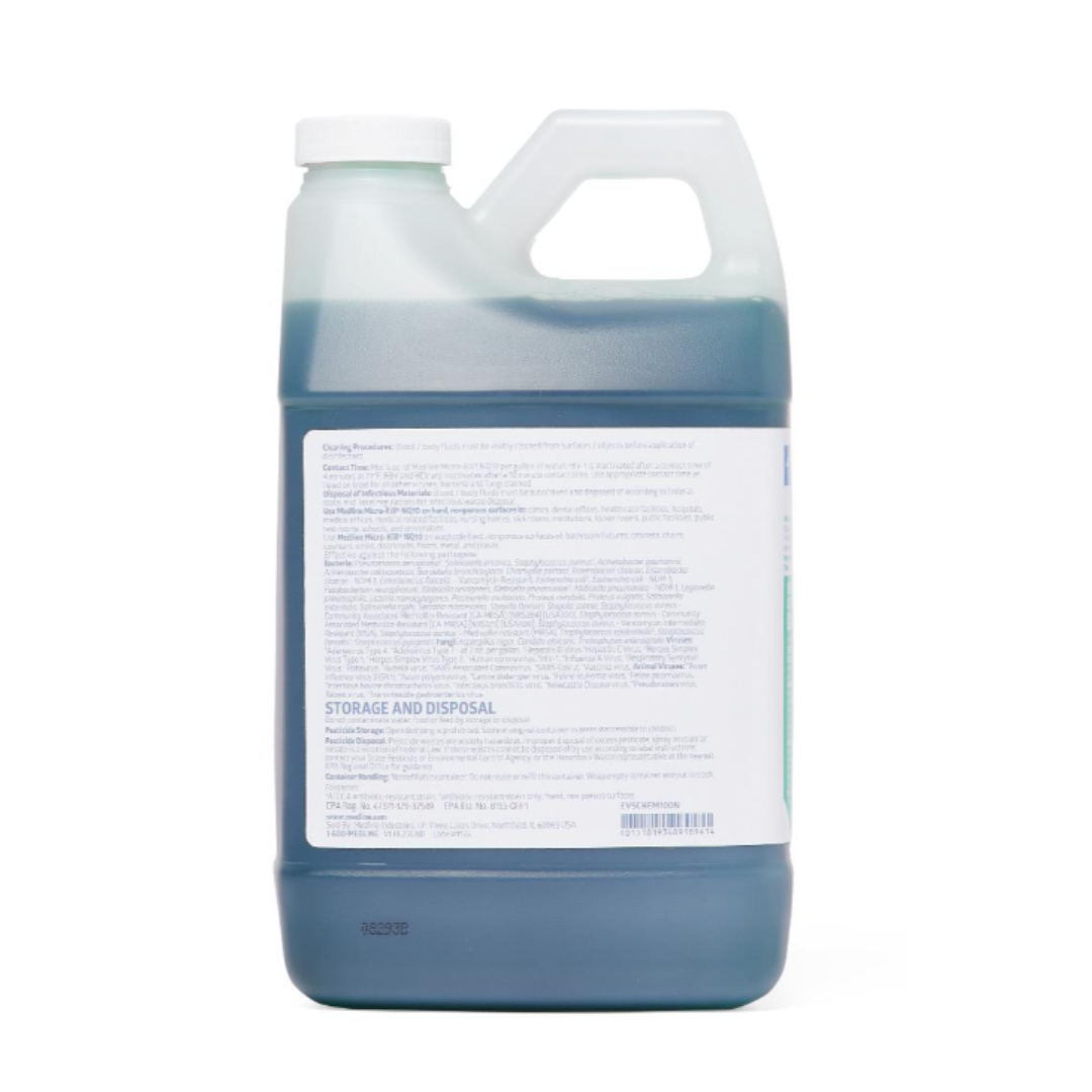 A translucent plastic jug of Medline Micro-Kill NQ10 Disinfectant (64 oz), filled with dark blue liquid and featuring a top handle and white label, is shown from the back, making the label's text hard to read.