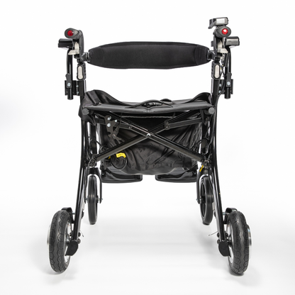 The Miracle Mobility Portable 4N1 Walker Wheelchair Combo is a black, folding travel aid with four wheels, rear view against white. It features a cushioned backrest, hand brakes, and a storage pouch under the seat.