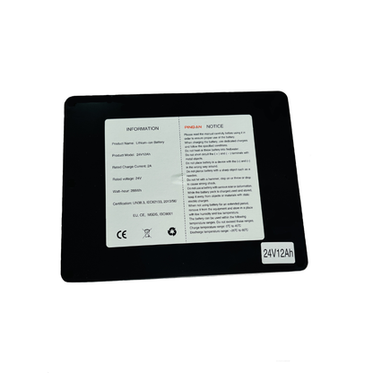 A rectangular replacement battery for The Miracle Mobility 6000 & 8000 Powerchairs featuring an English warning label, model 24V12Ah, charging info, certifications, and safety icons for this long-range wheelchair battery.