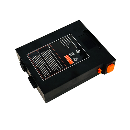 Battery for The Miracle Mobility Palladium 8500 Powerchair—rectangular black 24V 12Ah lithium pack with instruction label, orange/black connectors, and handle. Perfect as a replacement battery; shown on a white background.