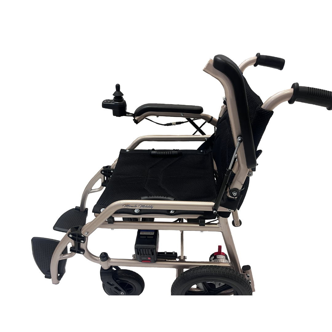 The Miracle Mobility Falcon 5000 Lightweight Powerchair features a black seat, joystick armrest control, footrests, and durable rear wheels—a foldable electric wheelchair ideal for travel, shown from the side on a white background.
