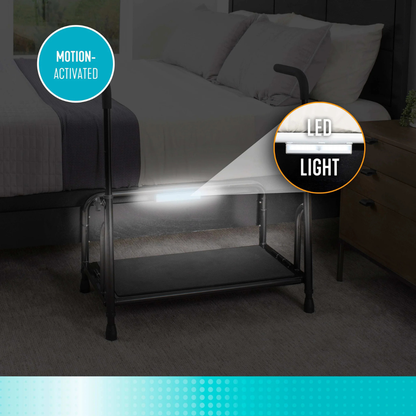The Stander Step Bedside Platform with LED lighting is attached under a safety rail, illuminating the area and providing convenient, secure nighttime access next to the bed.