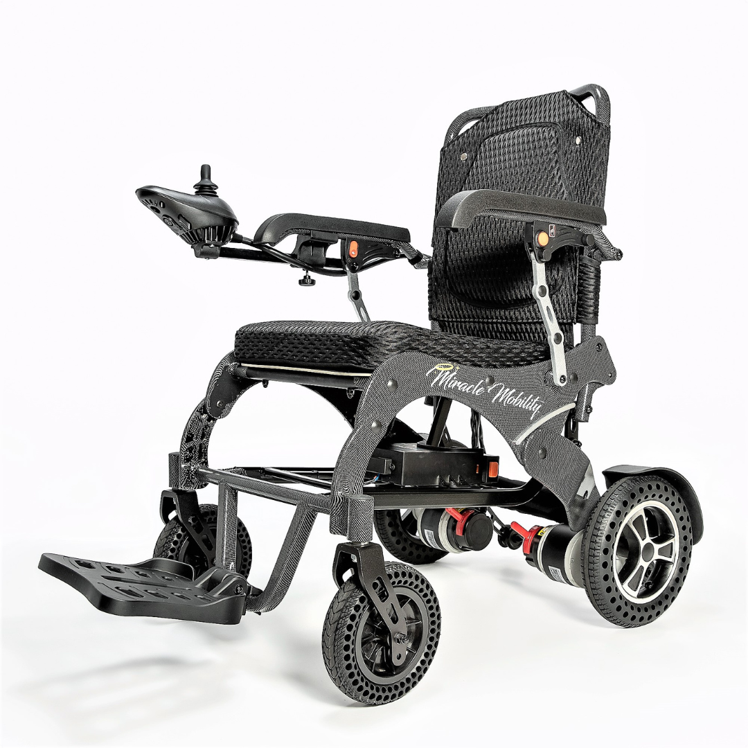 The Miracle Mobility Palladium 8500 Portable Powerchair features a lightweight, foldable design with a black mesh seat, armrests, joystick controller, and sturdy wheels for comfort and easy mobility. The Miracle Mobility logo is displayed on the frame.