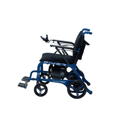 The Monarch Flyer Ultra-Lite Carbon Powerchair, shown in profile against a white background, features blue and black colors, footrests, armrests, a padded seat, and a joystick—ideal for highlighting specs or making demo videos.