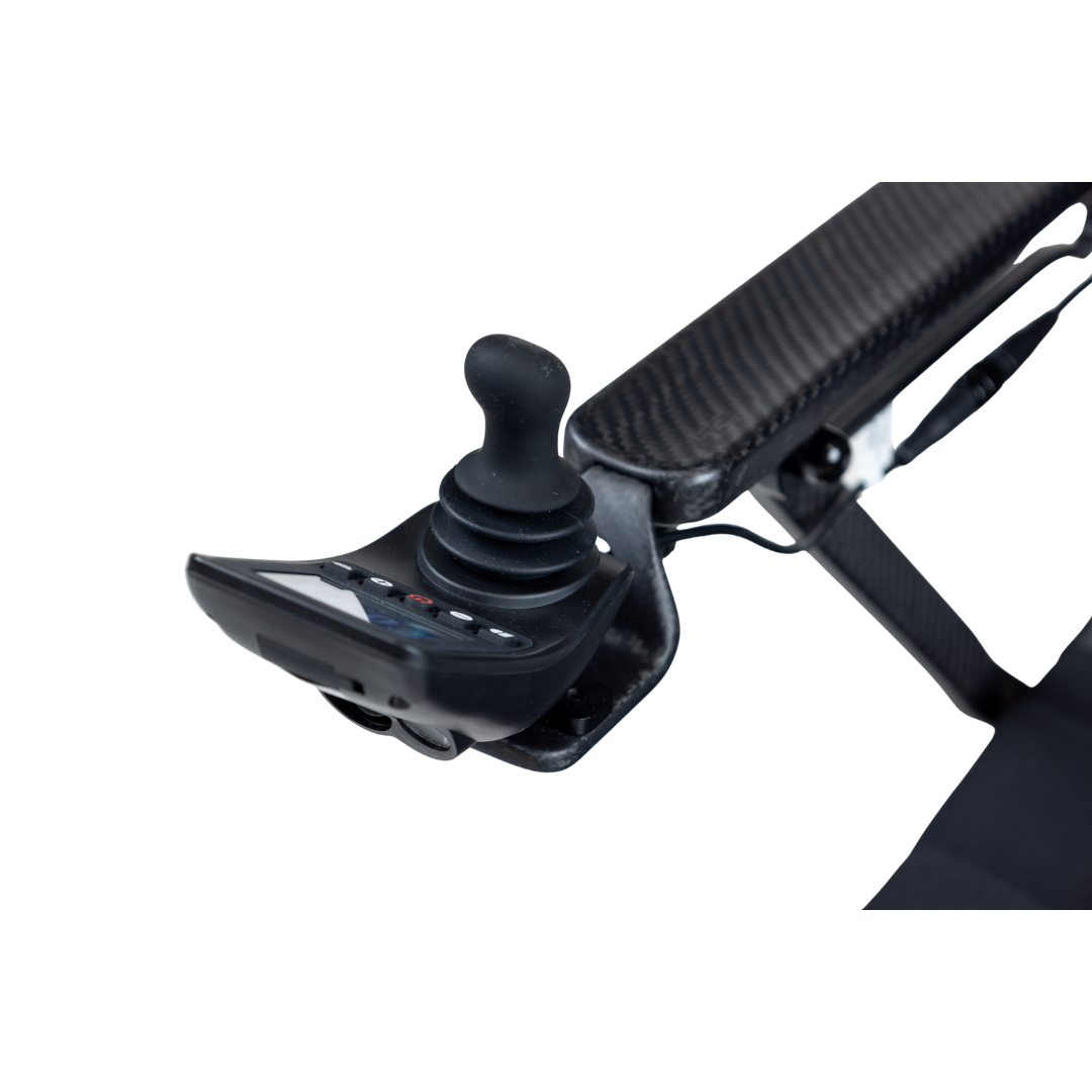 Close-up of a black joystick control panel with buttons and display, attached to the armrest of the Monarch Flyer Ultra-Lite Carbon Powerchair—see specifications for detailed features.