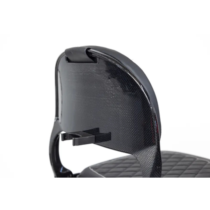 Close-up of the backrest of the Monarch Genie Ultralight Portable Mobility Scooter, featuring a glossy black design and quilted seat upholstery with a small horizontal attachment on the backrest.