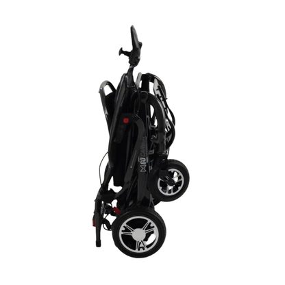 The Monarch MM60 Carbon Ultralite Electric Wheelchair is shown folded upright, highlighting its compact design with visible wheels and handle, all set against a white background.