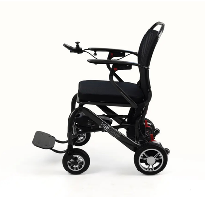 The Monarch MM60 Carbon Ultralite Electric Wheelchair, shown in a side view against a white background, features a black frame with joystick control on the armrest, a cushioned seat, footrest, and four wheels. This ultra-lightweight folding wheelchair is designed to provide both convenience and comfort for everyday mobility.