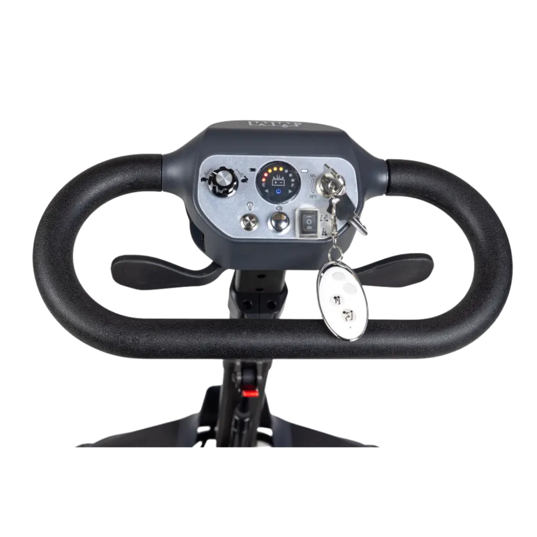 Close-up of the Monarch Genie Auto Folding Portable Scooter control panel, featuring a steering handle, buttons, switches, and an ignition key with a white keychain—ideal for anyone needing detailed info before purchasing.