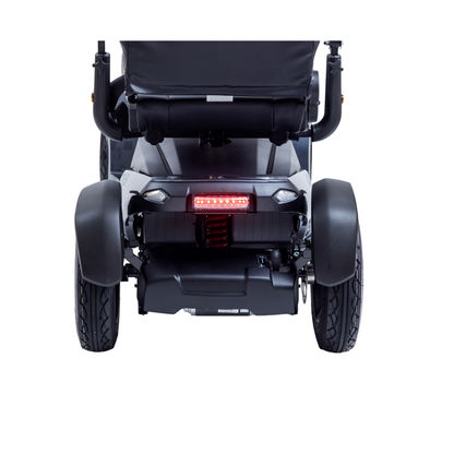 Rear view of the Monarch Obsidian HD Outdoor Mobility Scooter in black, showcasing its large wheels, suspension system, and red LED tail light against a white background. Explore more photos, videos, specs, and warranty info for this model.