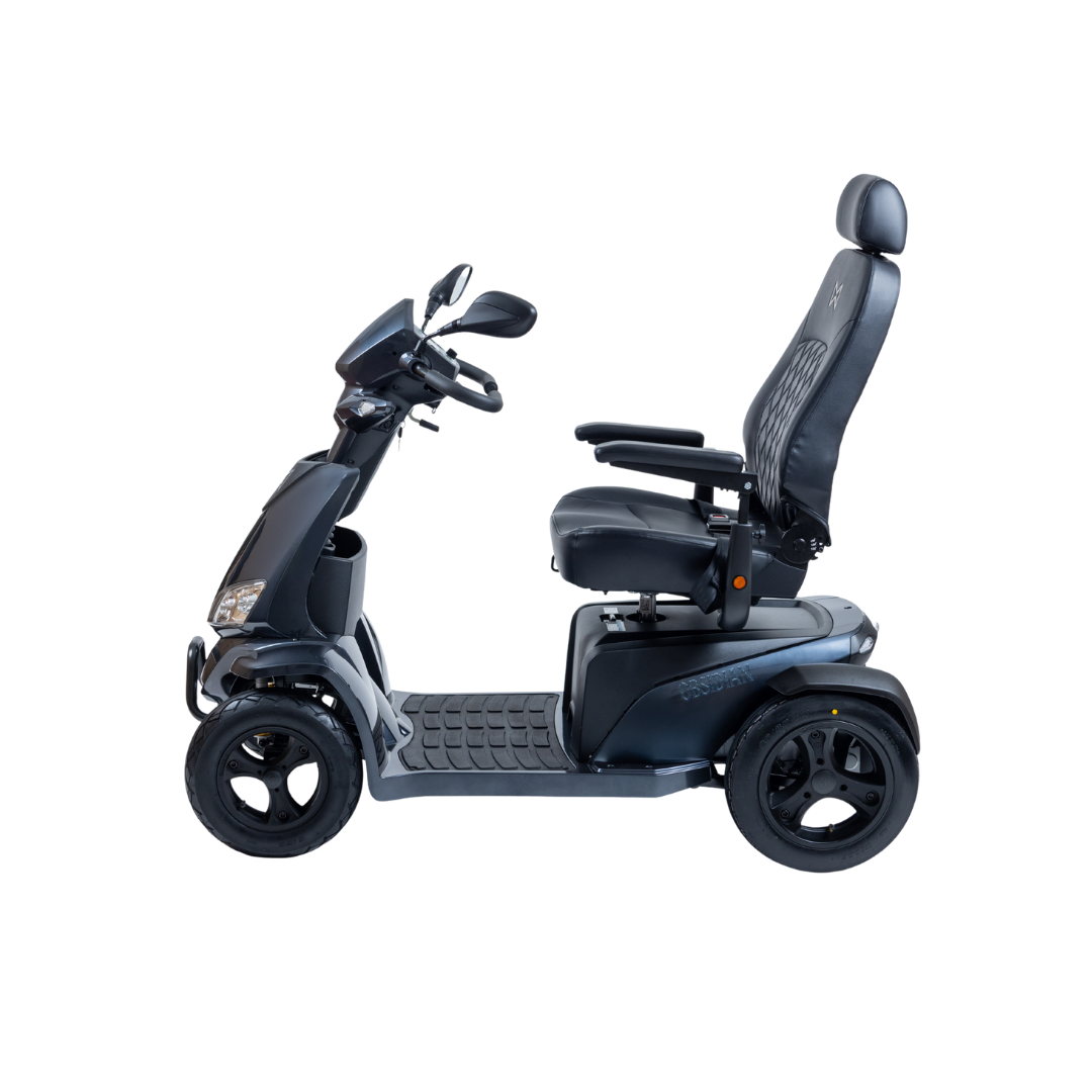 The Monarch Obsidian HD Outdoor Mobility Scooter, shown in black with four wheels, a cushioned seat with armrests and headrest, and side-view handlebars, is pictured against a white background. See specs and warranty info for details.