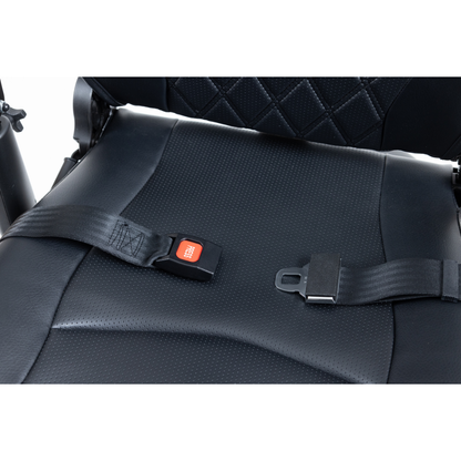 Close-up of the Monarch Obsidian HD Outdoor Mobility Scooter’s black cushioned seat with an unfastened seatbelt, featuring a quilted, textured backrest. Check product specifications for detailed design and warranty information.