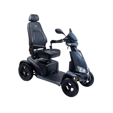 The Monarch Obsidian HD Outdoor Mobility Scooter, shown in black with four wheels, high backrest, armrests, and foot platform, features a sporty design with handlebars and mirrors. See specifications or watch videos for more details.