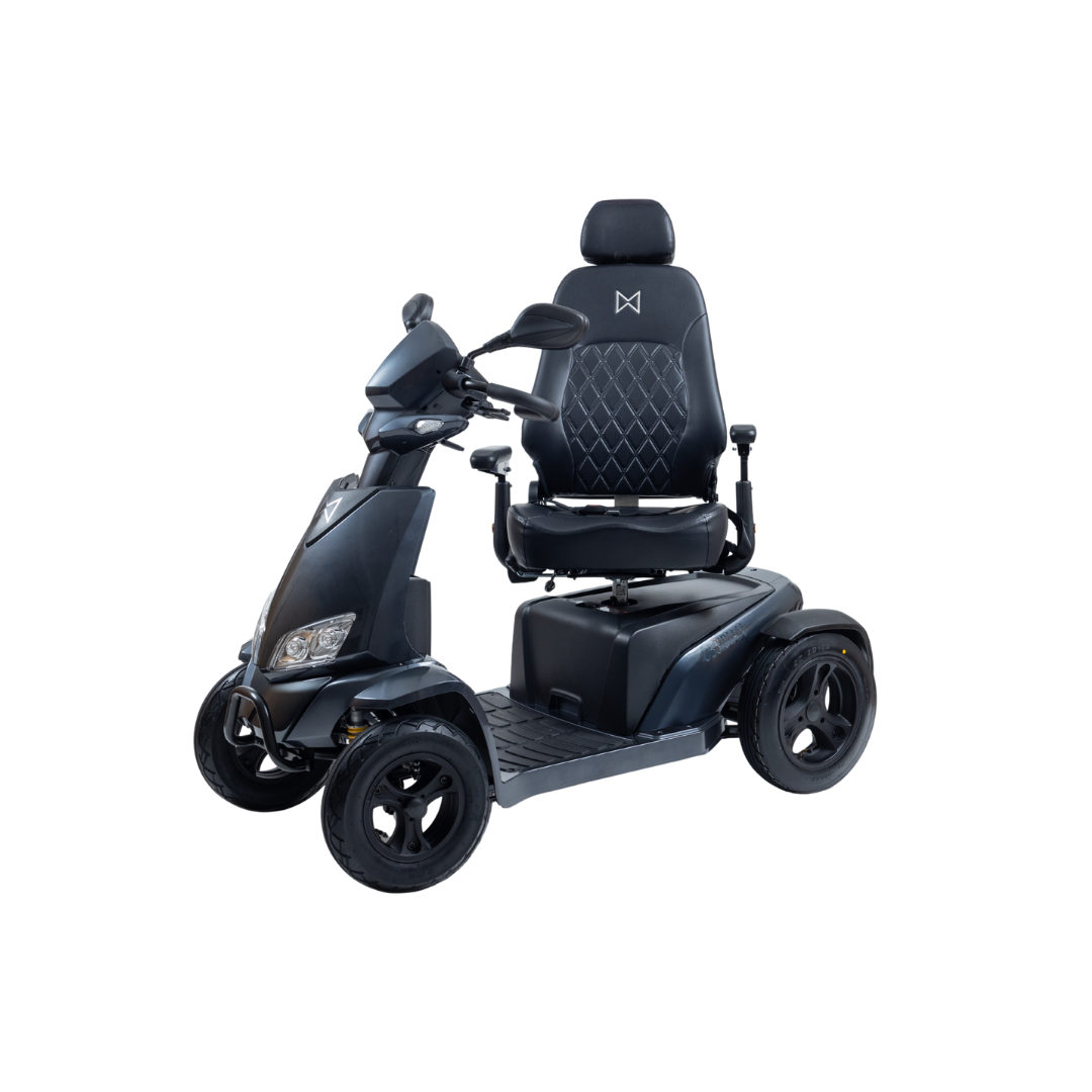 The Monarch Obsidian HD Outdoor Mobility Scooter is a modern black four-wheel scooter with a padded seat, headrest, armrests, and textured foot platform. Photographed on a white background. Watch videos for details and specs.