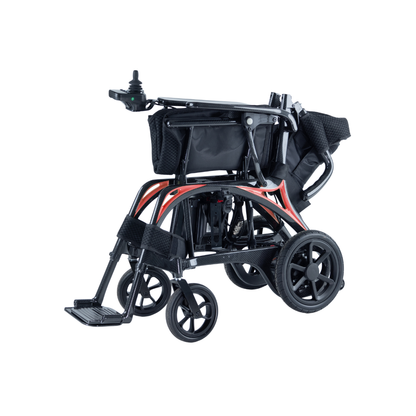 The Monarch Ezi Fold Carbon Portable Power Wheelchair features a lightweight black and red frame, foldable design for compact transport, footrests, and small front wheels.