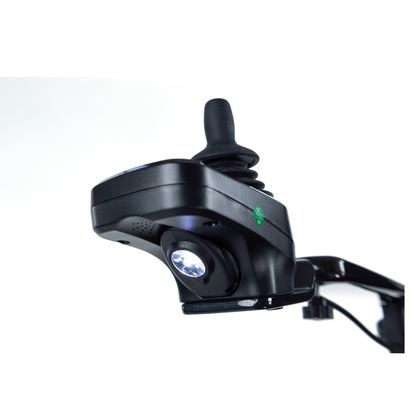 Close-up of a black joystick controller with integrated LED light, mounted on a metal arm, from the Monarch Ezi Fold Carbon Portable Power Wheelchair, shown against a white background.