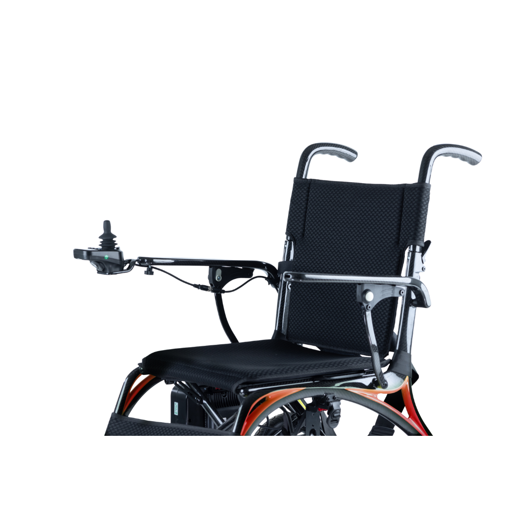 The Monarch Ezi Fold Carbon Portable Power Wheelchair features a black cushioned seat, armrest joystick control, rear push handles, and is shown on a white background.