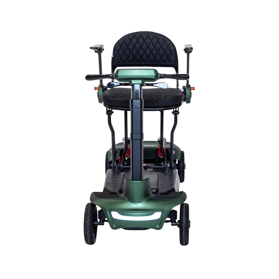 Front view of the Monarch Smarti Plus Ultra-Lite Auto Folding Scooter in green, featuring a black cushioned seat, backrest, armrests, handlebars, and three wheels for enhanced accessibility against a white background.
