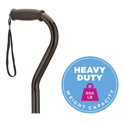 Close-up of the handle of the Nova Heavy Duty Bariatric Quad Cane with Large Base in black, featuring a wrist strap, shown next to a blue badge that reads HEAVY DUTY WEIGHT CAPACITY 500 LB with a pink weight icon in the center.