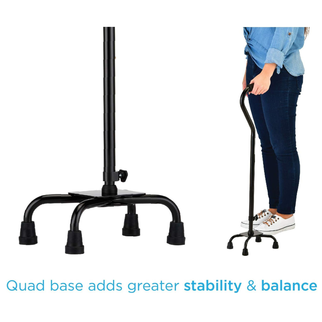 A person stands holding the Nova Heavy Duty Bariatric Quad Cane with Large Base, featuring four rubber-tipped legs. The cane’s large base offers added stability and balance. Text reads: Quad base adds greater stability & balance.
