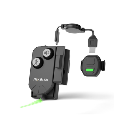 The NexStride® Visual and Auditory Cueing Device For Walking Aids is a black device featuring buttons, a detachable cord, and a compact remote. It projects a green laser line from the bottom to provide visual and auditory cues for increased accessibility and mobility assistance.
