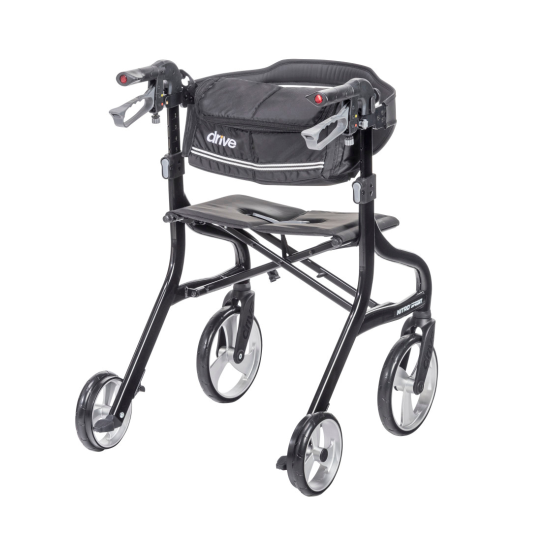 The Drive Nitro® Sprint Rollator with Accessory Bundle is lightweight, features four wheels, a padded seat, ergonomic hand brakes, a “drive” storage pouch, and offers easy maneuverability for daily use.