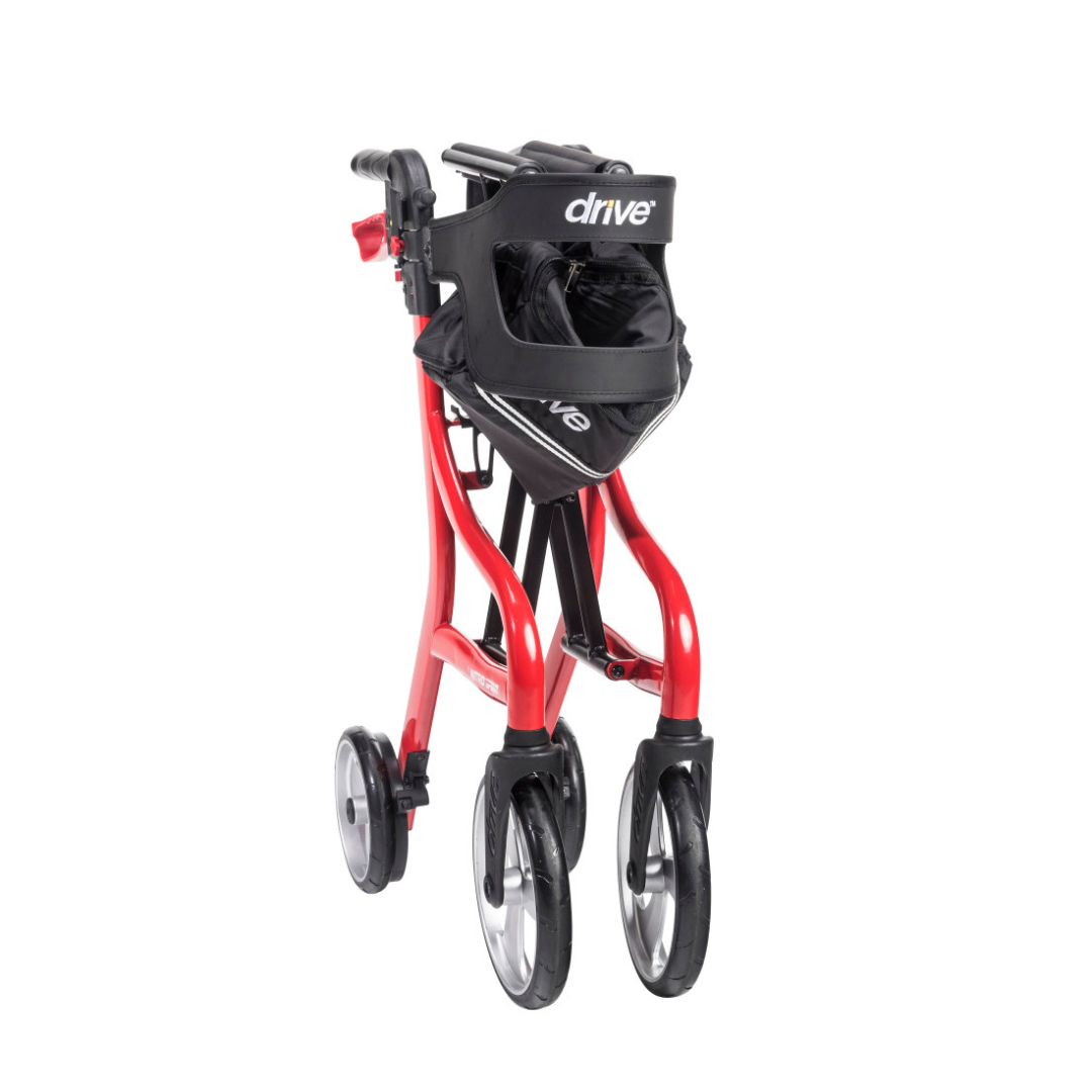 A red Drive Nitro® Sprint Rollator with Accessory Bundle, featuring four wheels, ergonomic handles, a black "drive" storage bag, and shown folded compactly for easy transport.