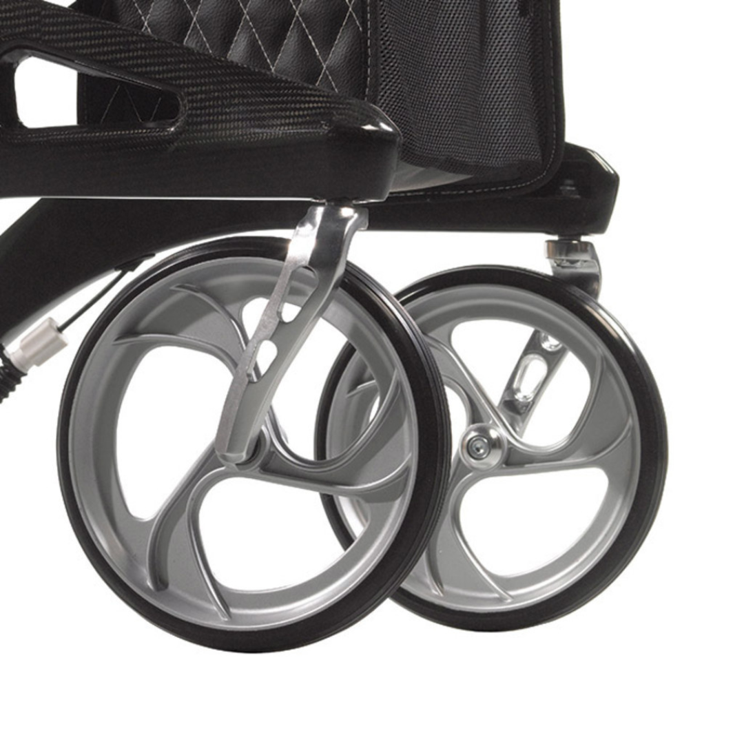 Close-up of two modern, silver wheelchair wheels with a black frame and quilted black seat—evoking the sleek design of the Drive Nitro® Elite CF Carbon Fiber Rollator.