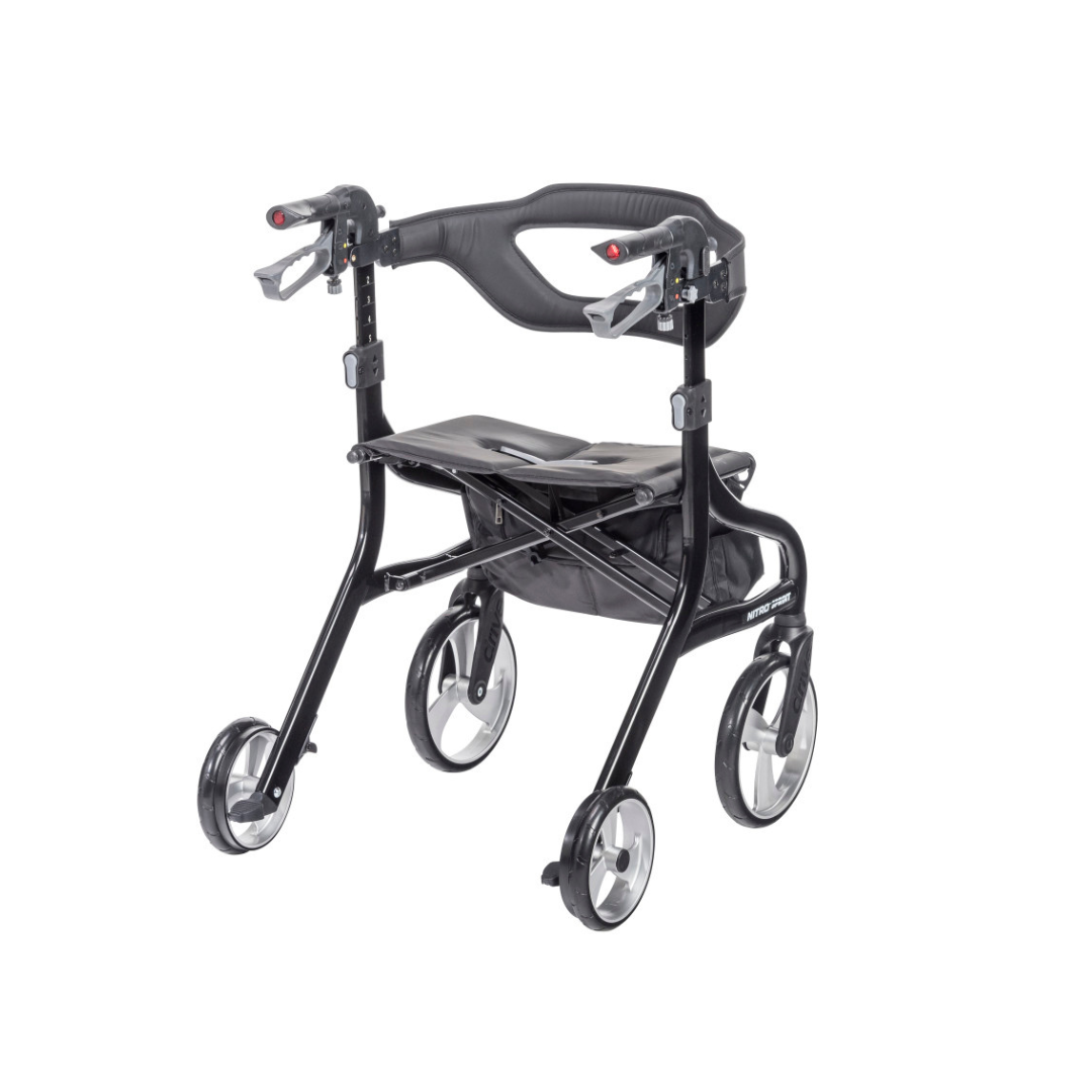 The Drive Nitro® Sprint Rollator with Accessory Bundle is a black, lightweight, foldable walker with four large wheels, hand brakes, padded seat, storage bag, and a curved backrest for comfort.