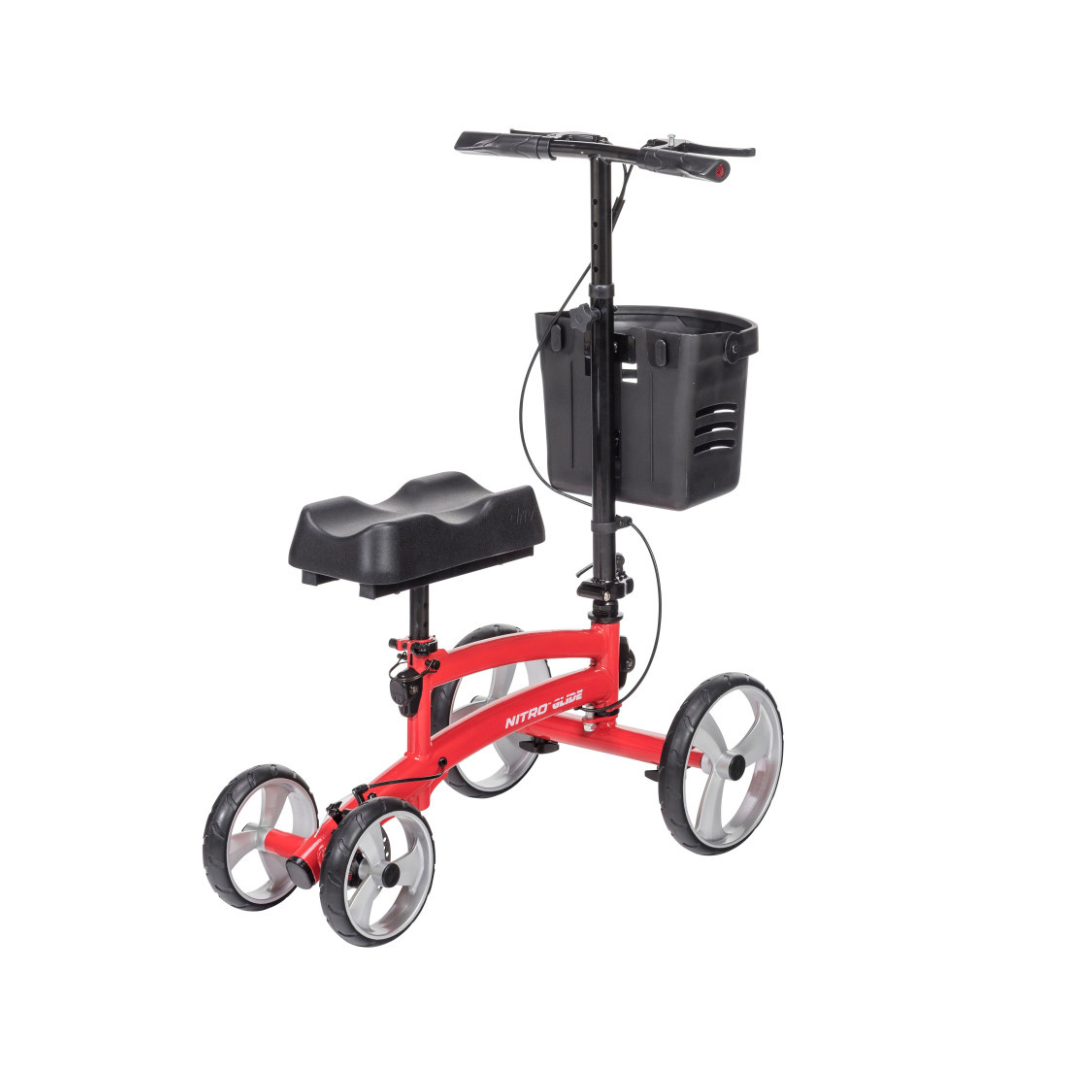 The Drive Folding Nitro® Glide Knee Walker offers four large wheels, a cushioned black knee platform, adjustable handlebar, hand brake, and front basket—a great mobility aid and crutches alternative.