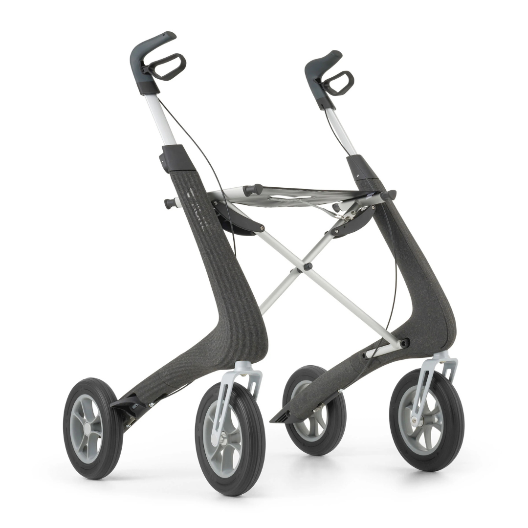 The byACRE Nordic Pioneer Lightweight Folding Rollator, weighing just 13 lbs, features four large wheels, ergonomic handles, and a sleek black and silver frame for modern style and excellent mobility support.