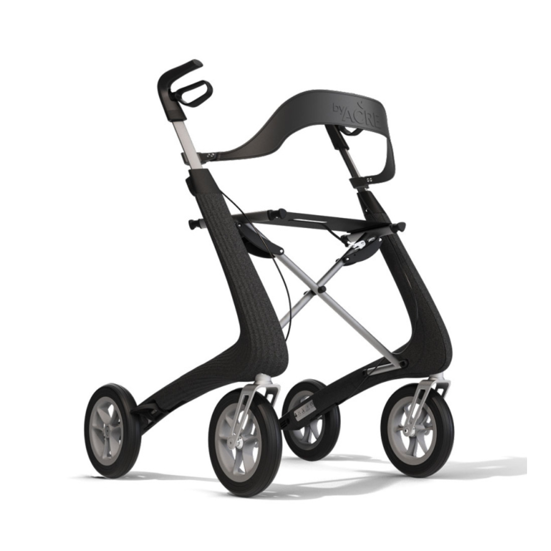 The byACRE Nordic Pioneer Lightweight Folding Rollator (only 13 lbs) features a sleek black and silver design, four large wheels, ergonomic handles, and a curved support bar for enhanced mobility and stability.