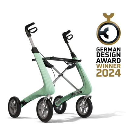 Light green byACRE Nordic Pioneer Lightweight Folding Rollator - Only 13 lbs, with four large wheels and ergonomic handles, is shown next to a German Design Award Winner 2024 emblem on a white background.