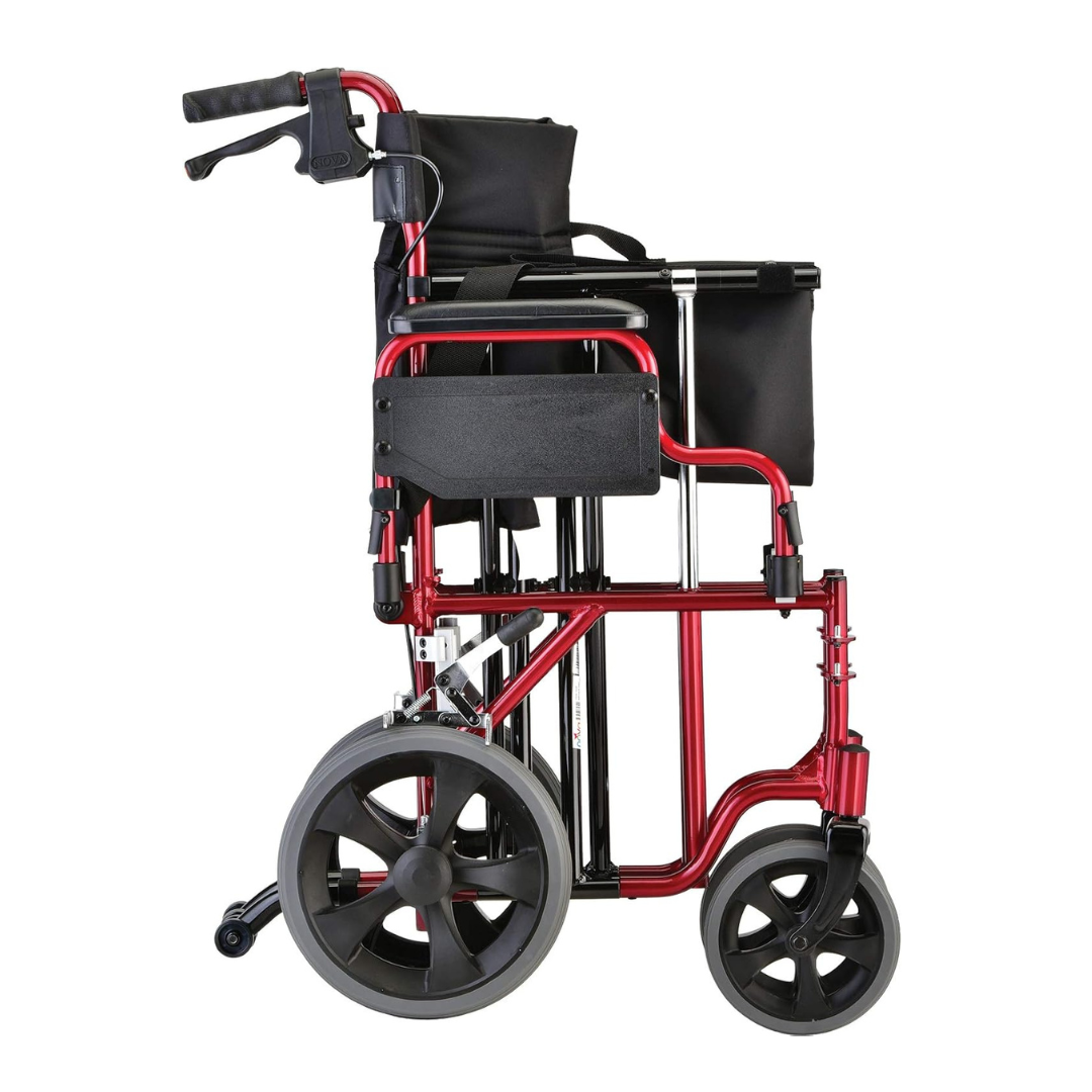 The Nova Medical 332 HD Bariatric Transport Chair, shown folded, features a red frame, 12 rear wheels, small front wheels, a black extra wide padded seat, and handles with brakes—ideal as a folding transport chair for travel.