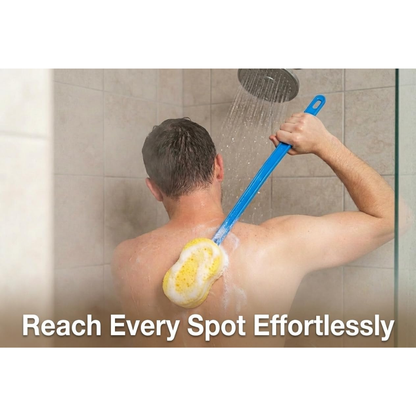 A man uses the Nova 23” Extra Long Bath & Back Sponge Brush (2 Pack) to wash his back in the shower. Water sprays from the showerhead, and text reads, Reach Every Spot Effortlessly.