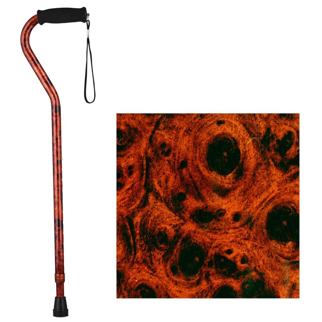 The Nova Designer Offset Walking Cane features a black handle, wrist strap, and an orange and black swirled woodgrain pattern; a close-up of this design appears beside the cane.
