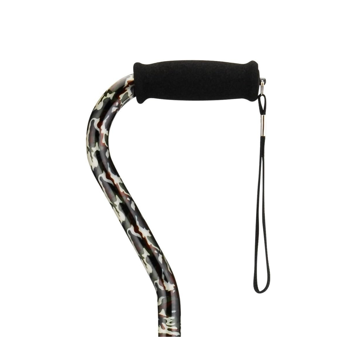 A close-up of a Nova Designer Offset Walking Cane featuring a camouflage-patterned shaft, black foam handle, and attached black wrist strap.
